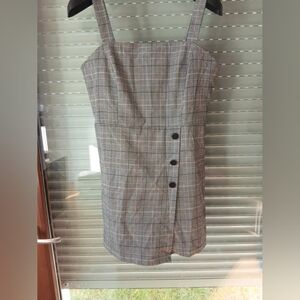 Plaid Sleeveless Mini Dress with Button Detail